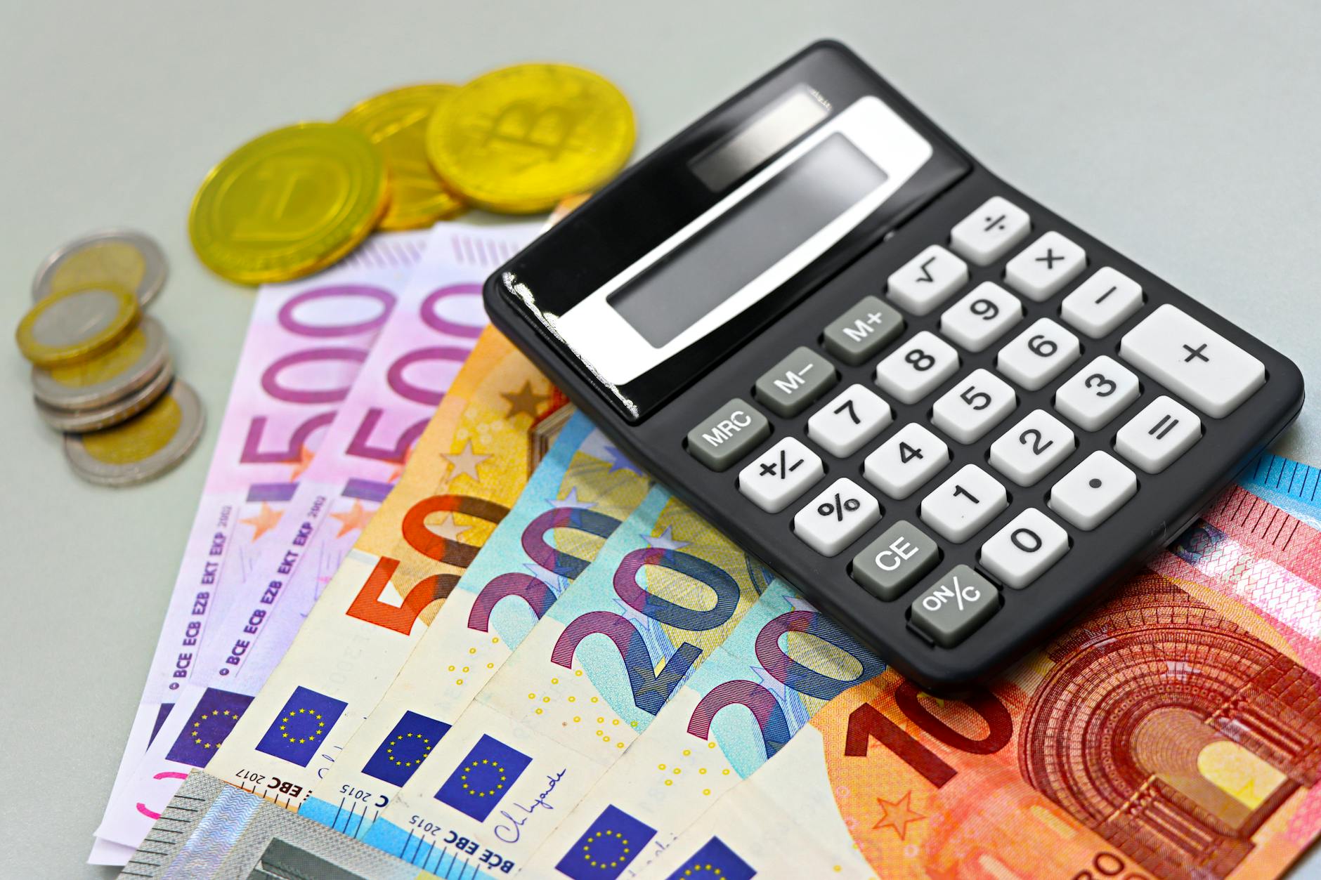 euro banknotes and calculator for financial analysis